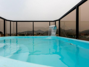 Duplex com cobertura, piscina e área gourmet no centro de Ubatuba